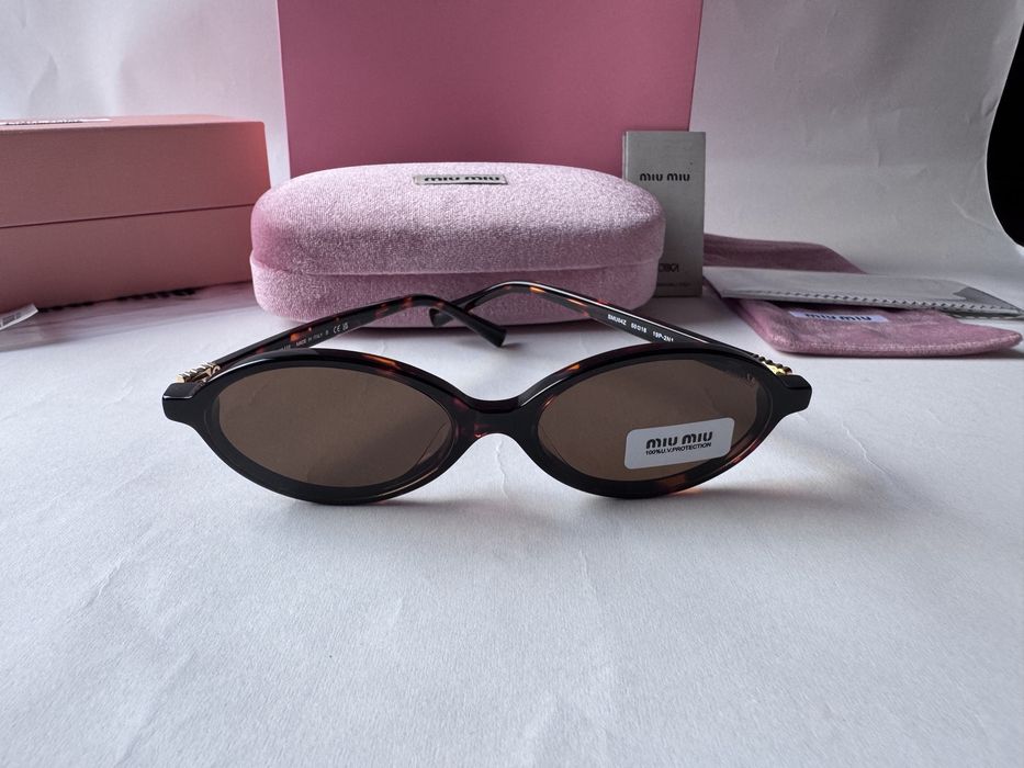 Ochelari de soare Miu Miu Oval SMU04Z 50-18 140, Noi