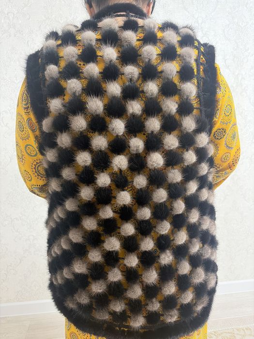 Норкавая жилет.