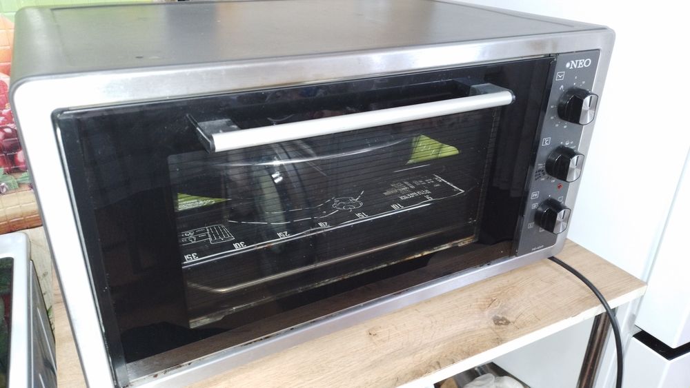 Продам духовую печь NEO