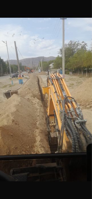 Эксковатор,Малютка колесный 55.60