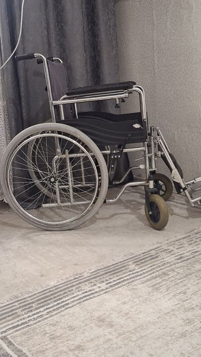 Инвалидная коляска