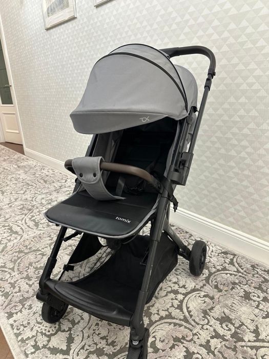 Прогулочная коляска от tomix flip