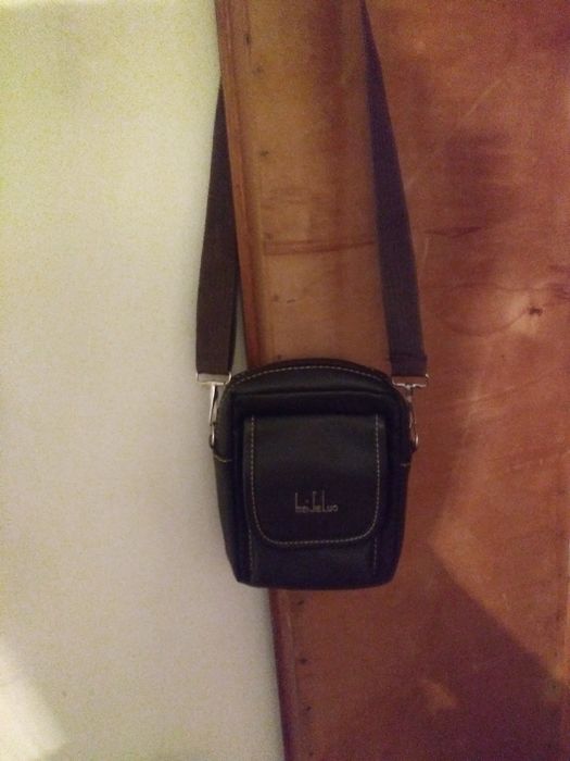 Продам барсетку кожанную