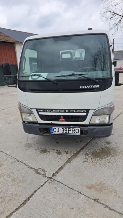 Mitsubishi Canter cu carlig abrollkipper