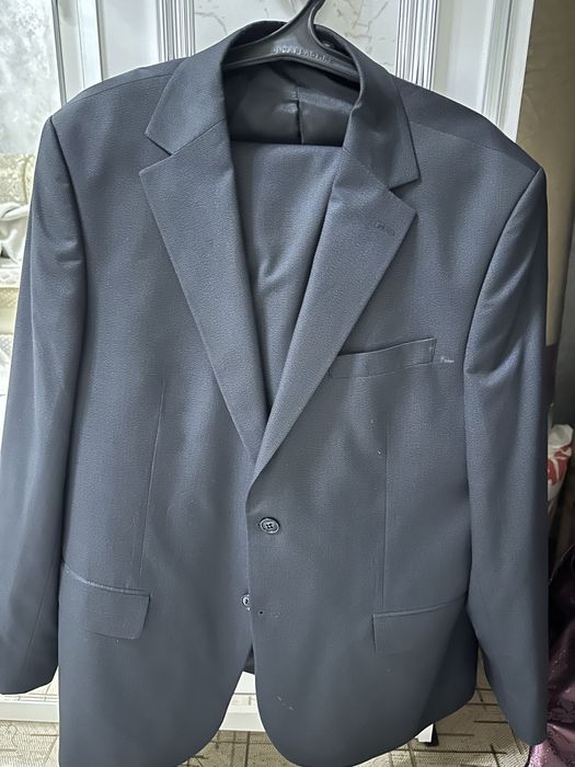 Кастюм 58/54 размера новый