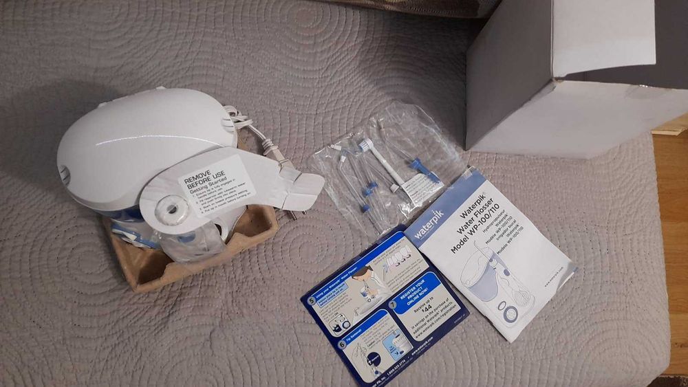 Зъбен душ ß Waterpik Ultra WP-100