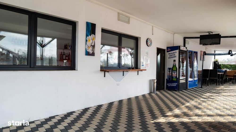 Vanzare casa cu restaurant, terasa si teren intravilan liber - Titu