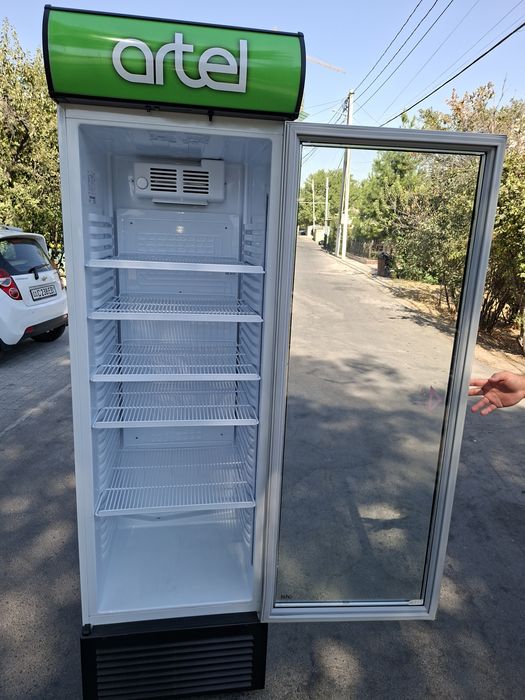 Срочно продам витрине холодильник артел как новый гарантия 3года есть
