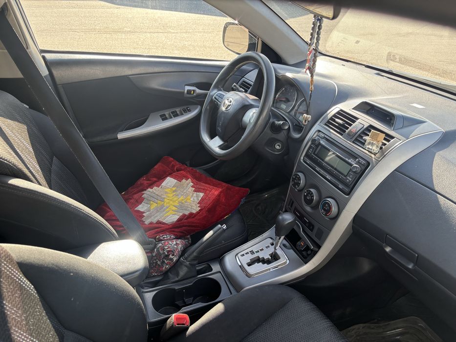 Машина Тойота королла