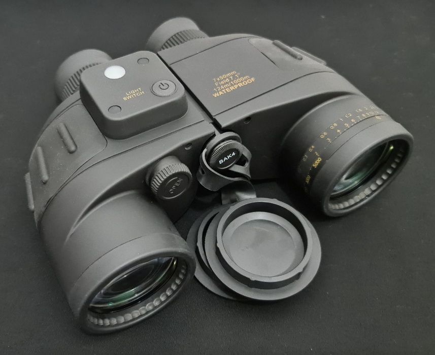Бинокль 7*50,(компас, даль.шкала,подсветка)в магазине binokli.uz
