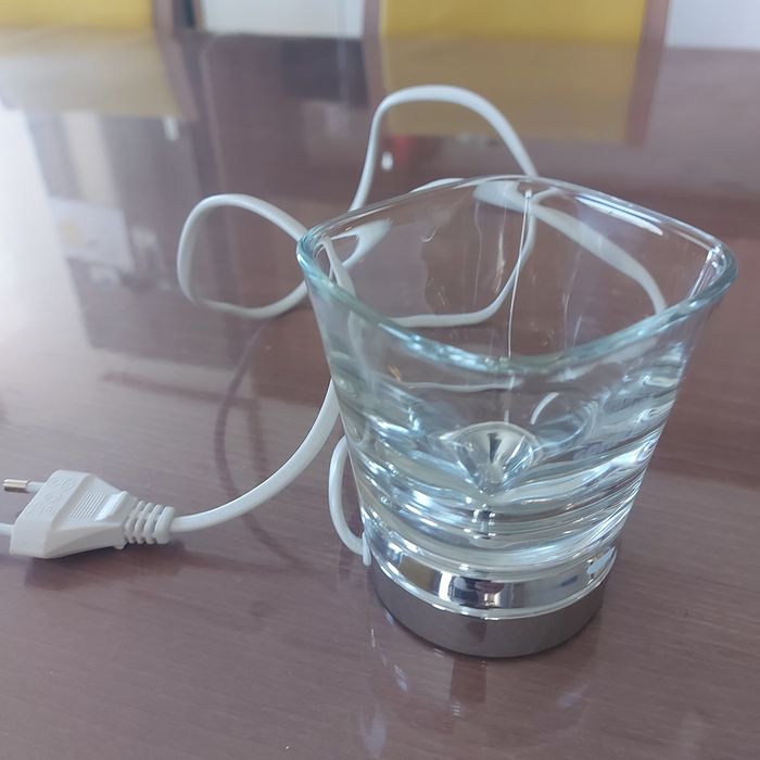 зарядно за електрическа четка  Philips Sonicare (модел HX9100).