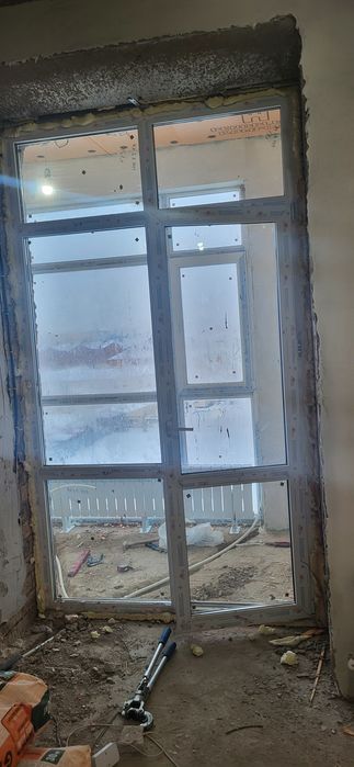 Окно пластиковые на выходе балкон