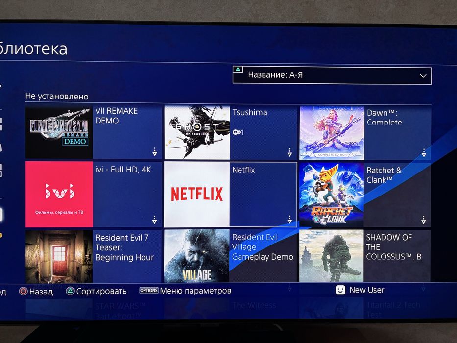 Продам PS4 вместе с играми