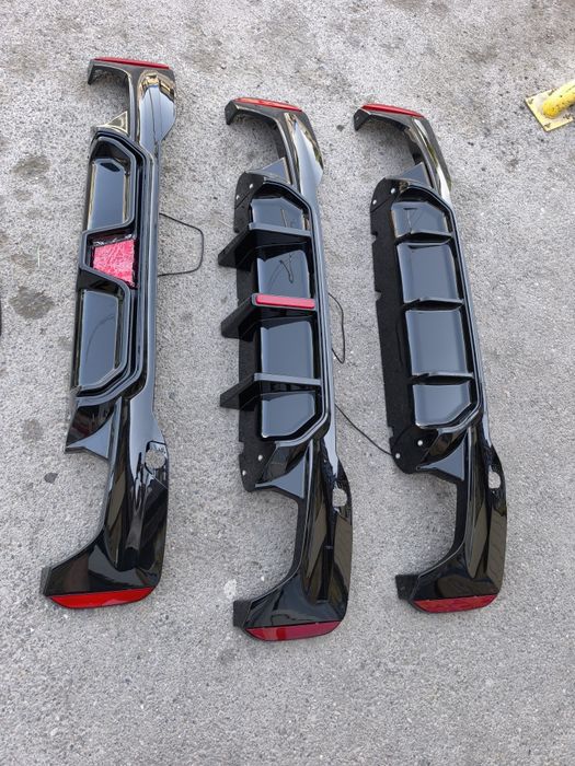 Диффузор бампера G30 накладка зад