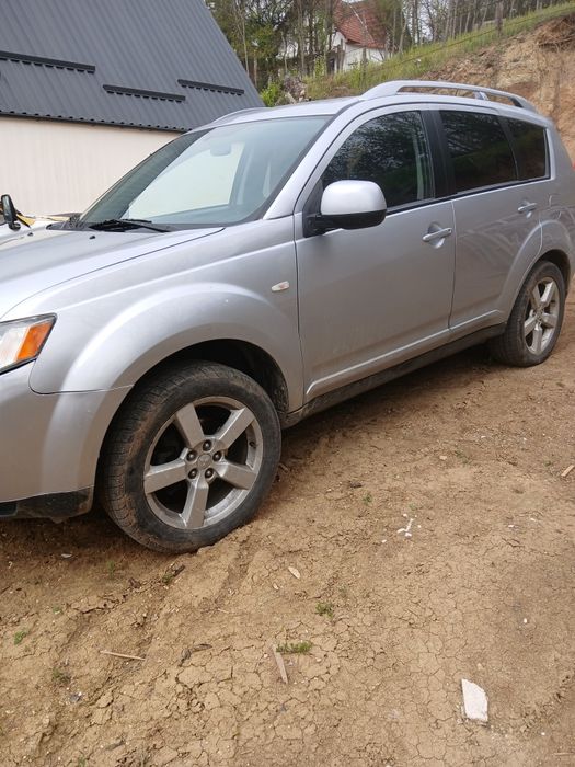 Vind Mitsubishi  Qulender An fab 2008 Amotor 2000 cm Geamuri electrice  ac  4x4.