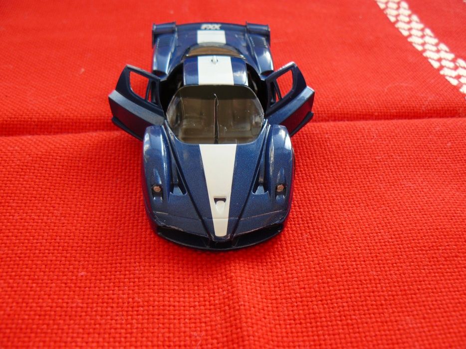 Macheta Auto FERRARI FXX Noua,Metalica,Scara 1:43,Produs De AmerCom