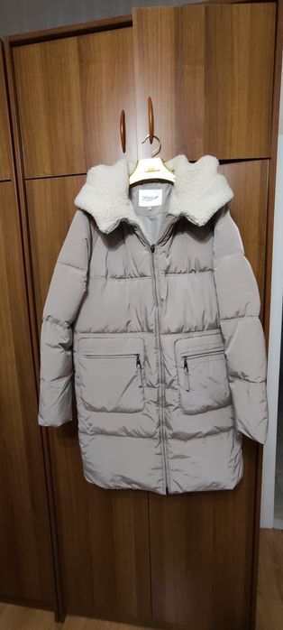 Продам пуховик женский
