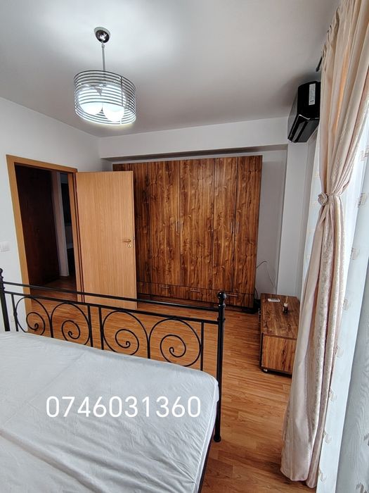 Închiriez apartament cu 2 camere + loc de parcare
