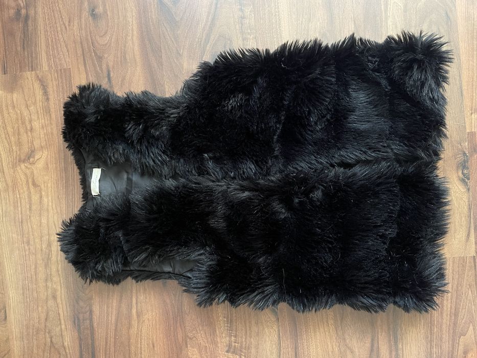 Дамски пухен елек