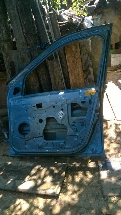 Vand usa dreapta față Logan 2007