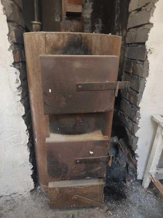 Твердотопливный отопительный Котел