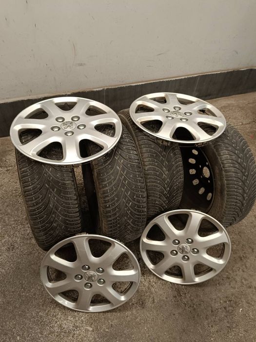 Зимни гуми със стоманени джанти и оригинални тасове