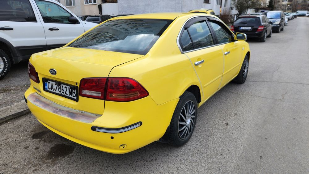 Киа Маджентис 2.0,16V,бензин-метан