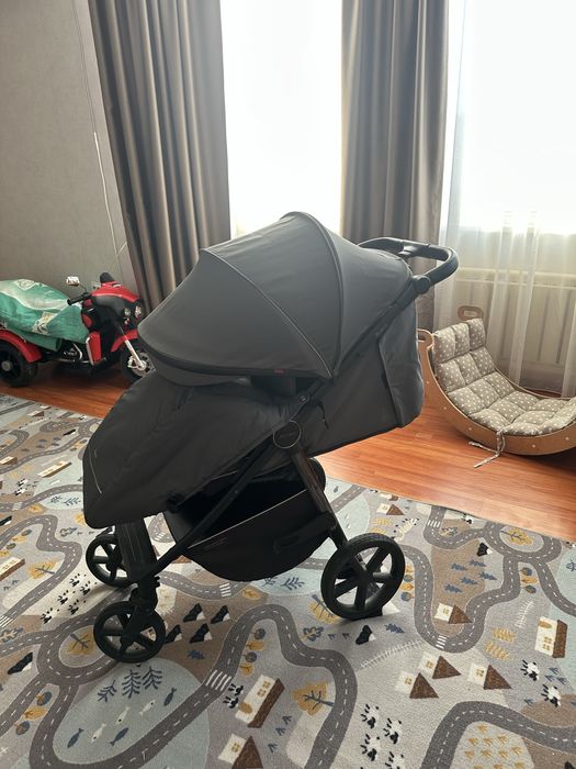 Коляска карела серая