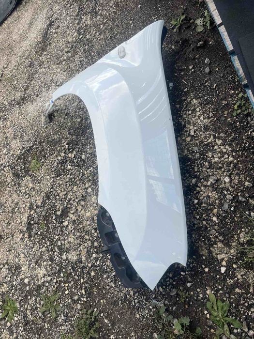 Десен калник Dacia duster 2015g оригинален бял както го виждате