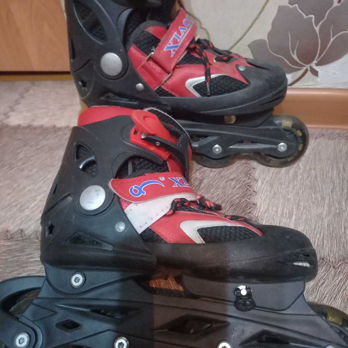 Роликовые коньки