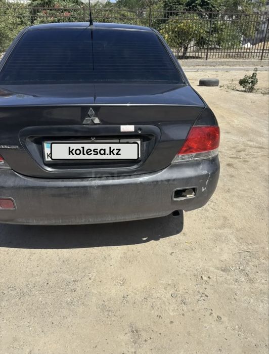 Машина Mitsubishi Lancer
