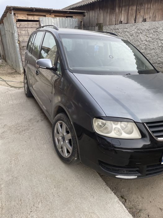 De vinzare touran 1.6