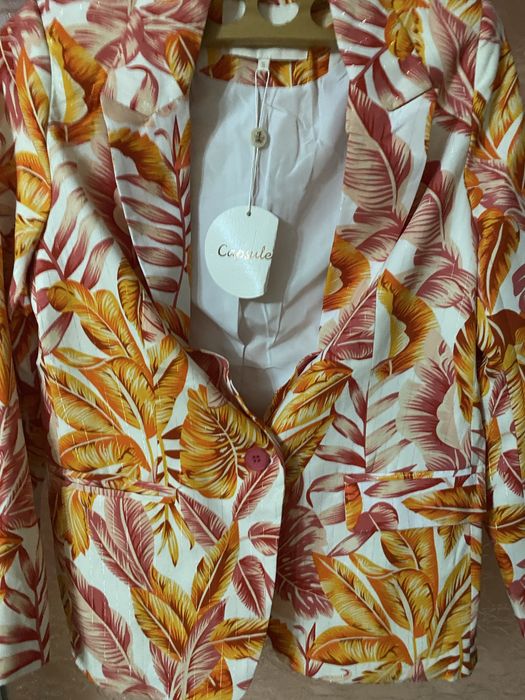 Sacou nou, cu eticheta