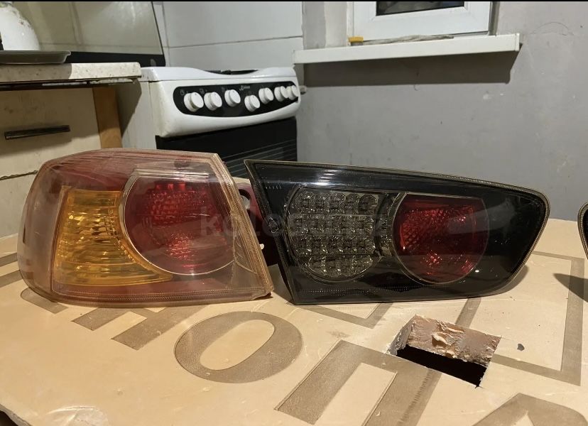 Задние фонари лансер 10