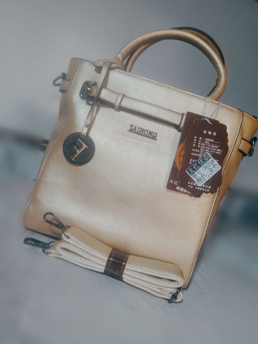 Ayollar sumkasi stil