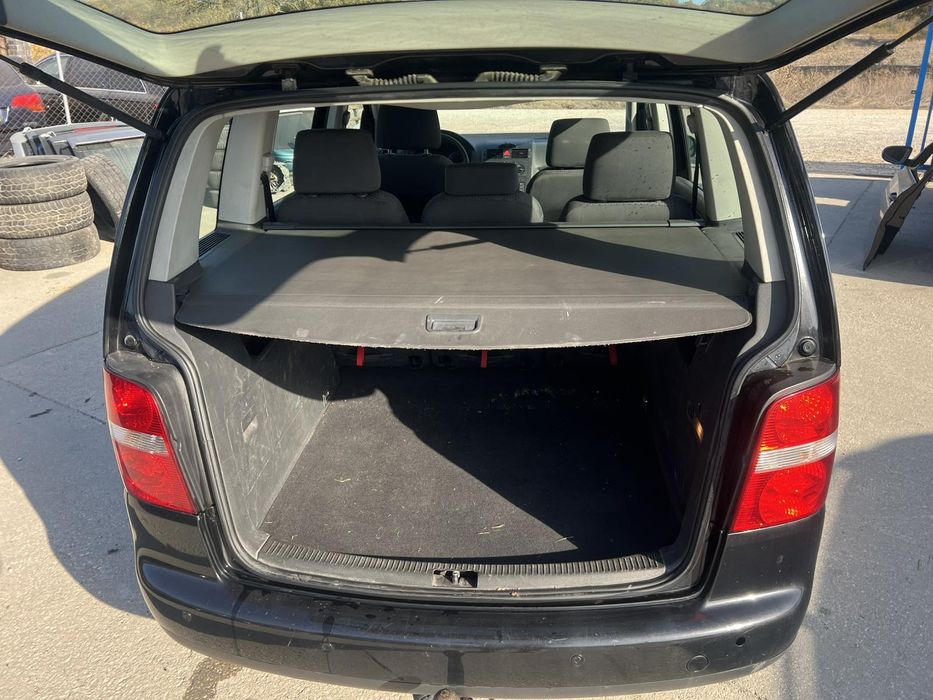 Vw Tuaran 1.9 105кс.код на мотора BKC 2006 г