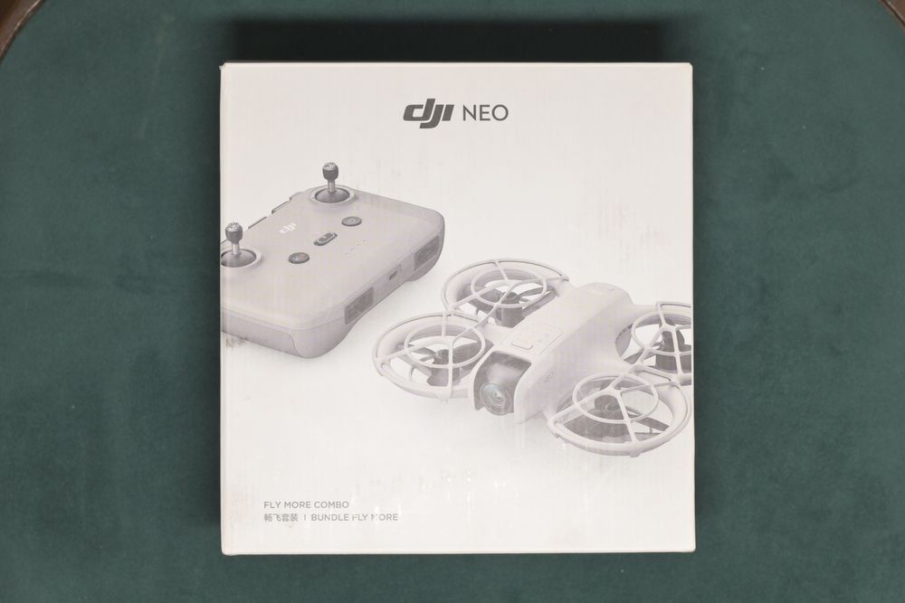 Дрон DJI Neo Fly More Combo серый