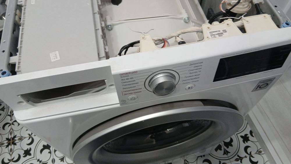 Ремонт стиральных машин и Холодильников