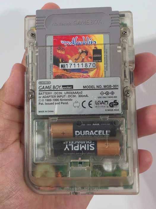 Nintendo Gameboy Poket transparent editie limitata si joc Aladdin