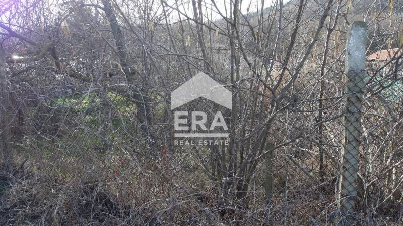 Урегулиран поземлен имот за продажба, с лице на главен път, в курортен
