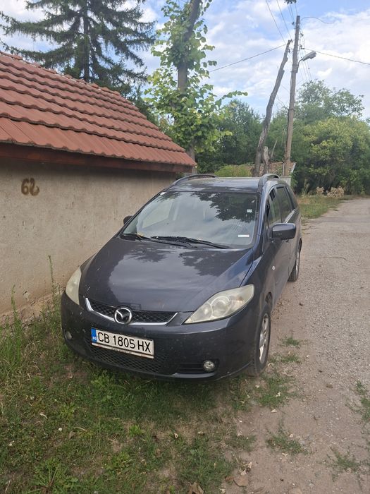 Мазда 5 на части