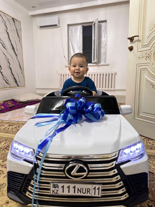 Детская машина электромобиль