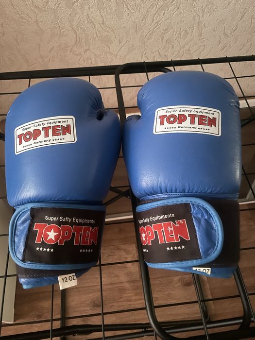 Перчатки боксерские(ММА) состояние новых.