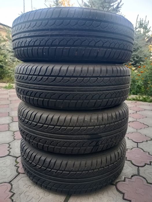 Продам комплект летних шин на дисках