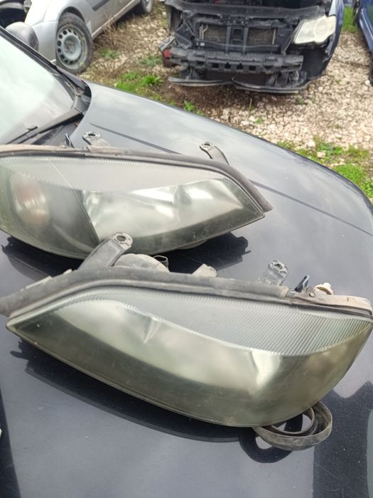 Faruri și triple Opel Astra G break 2003