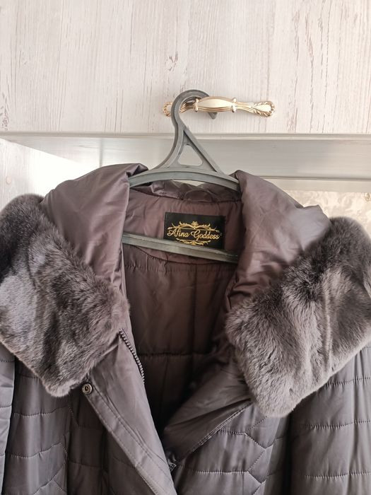 Продам зимний новый пуховик