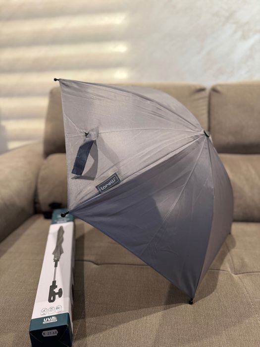 чашка за кафе и чадър за бебешка количка