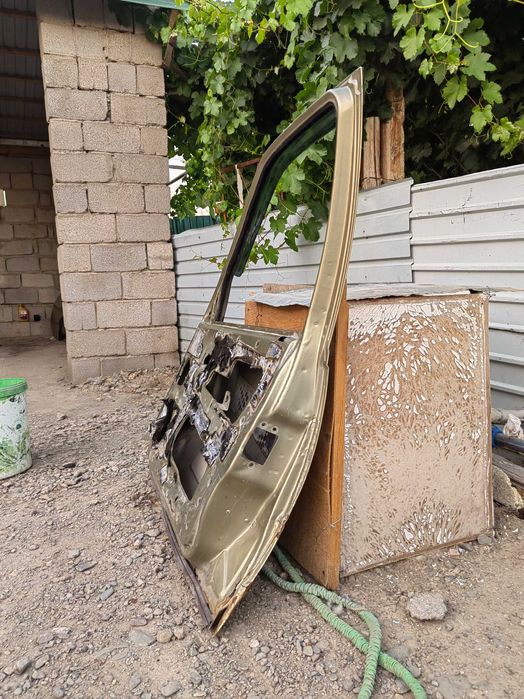 Двери нексия 2009