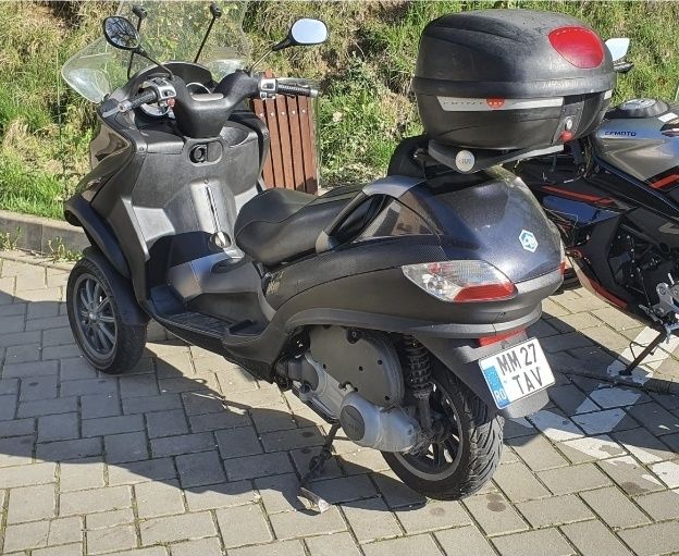 Scuter piagio mp3 , 250cc . 6000ei
