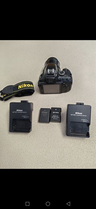Nikon D5100  cu obiective, doua încărcătoare și 3 acumulatori